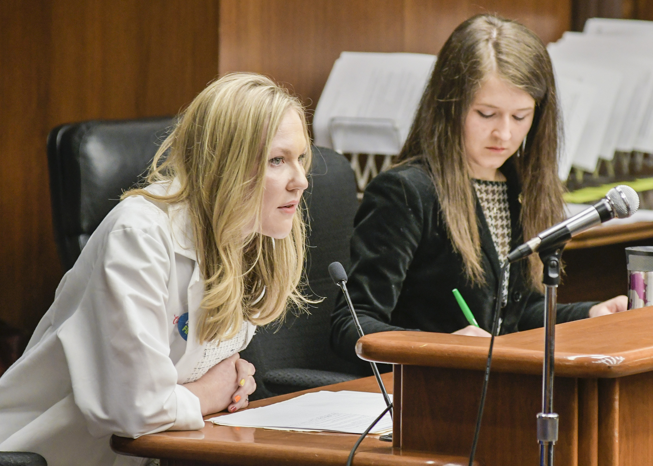 Dr. Erin Stevens shares concerns March 20 with the House Health and Human Services Reform Committee over a Rep. Abigail Whelan, right, bill that would require physicians to allow viewing of ultrasound imaging prior to an abortion. Photo by Andrew VonBank
